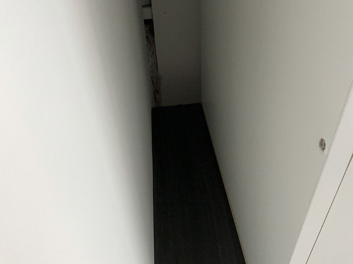 Gap to ceiling and kitchen, recorded during a handover inspection in Austral